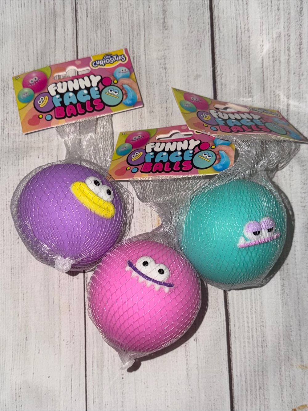 Lot of 3 Orb Curiosities Funny Face Balls Squishy Squeezy Pink, Purple, Aqua